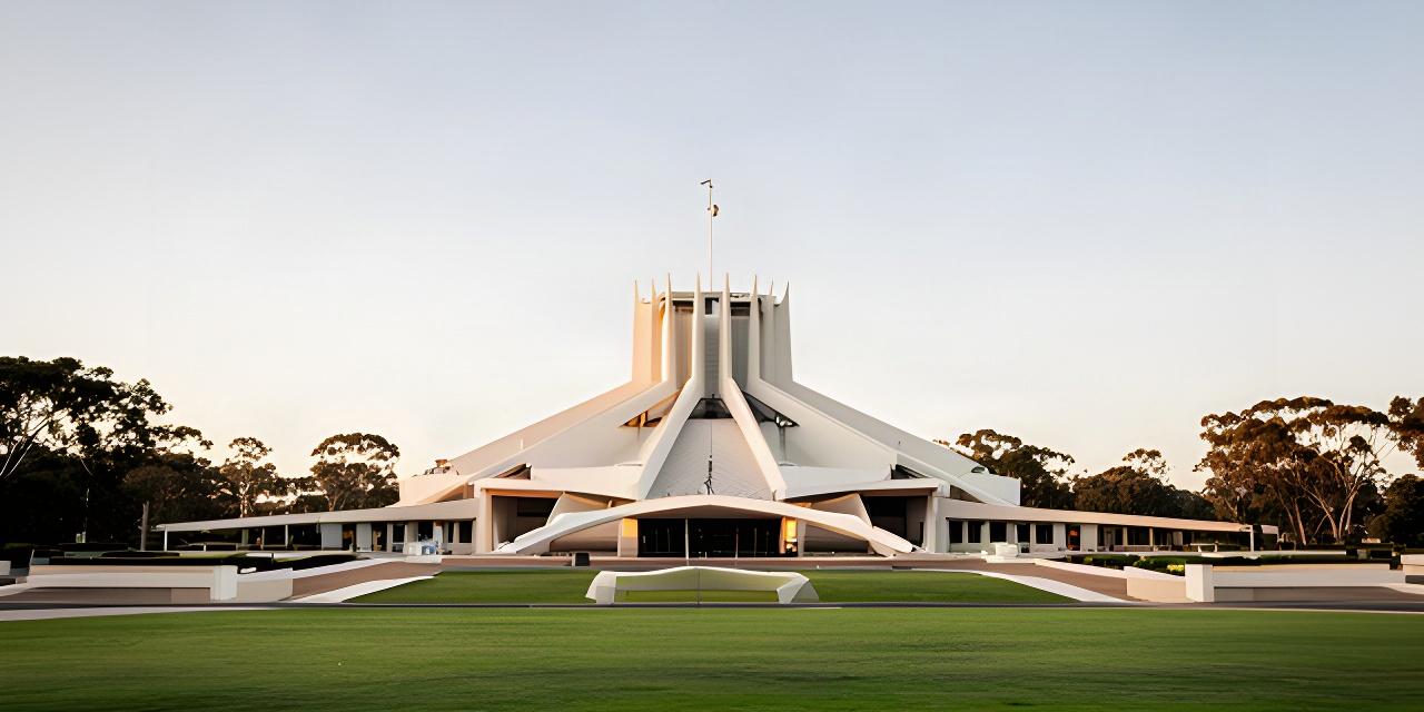 Australian Parliament House in Canberra beneath a pale morning sky